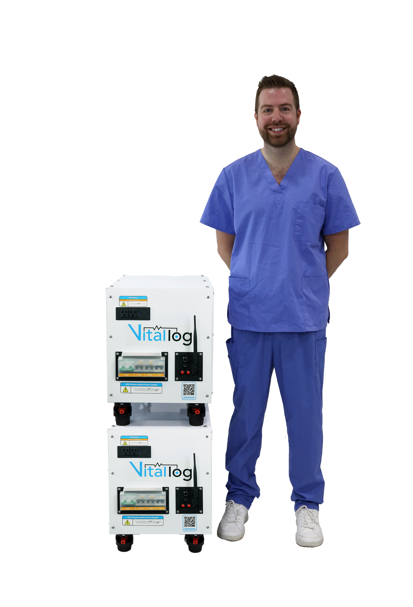 a doctor standing next to two of the 7kwh battery backups stacked on top of each other